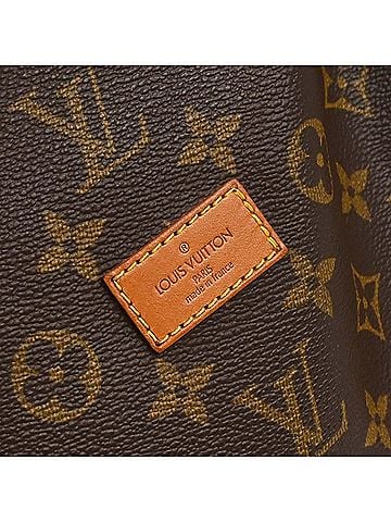Louis Vuitton Saumur Monogram Canvas Brown Canvas Shoulder Bag Bag (view 2)