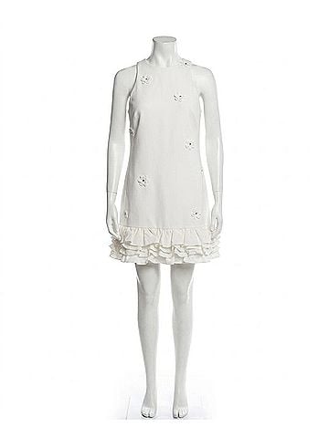 CeCe Sleeveless Ruffled-Hem Mini Dress in Ivory (view 1)