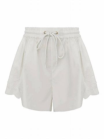Zimmermann Daylight Flat Front Shorts in Ivory (view 1)